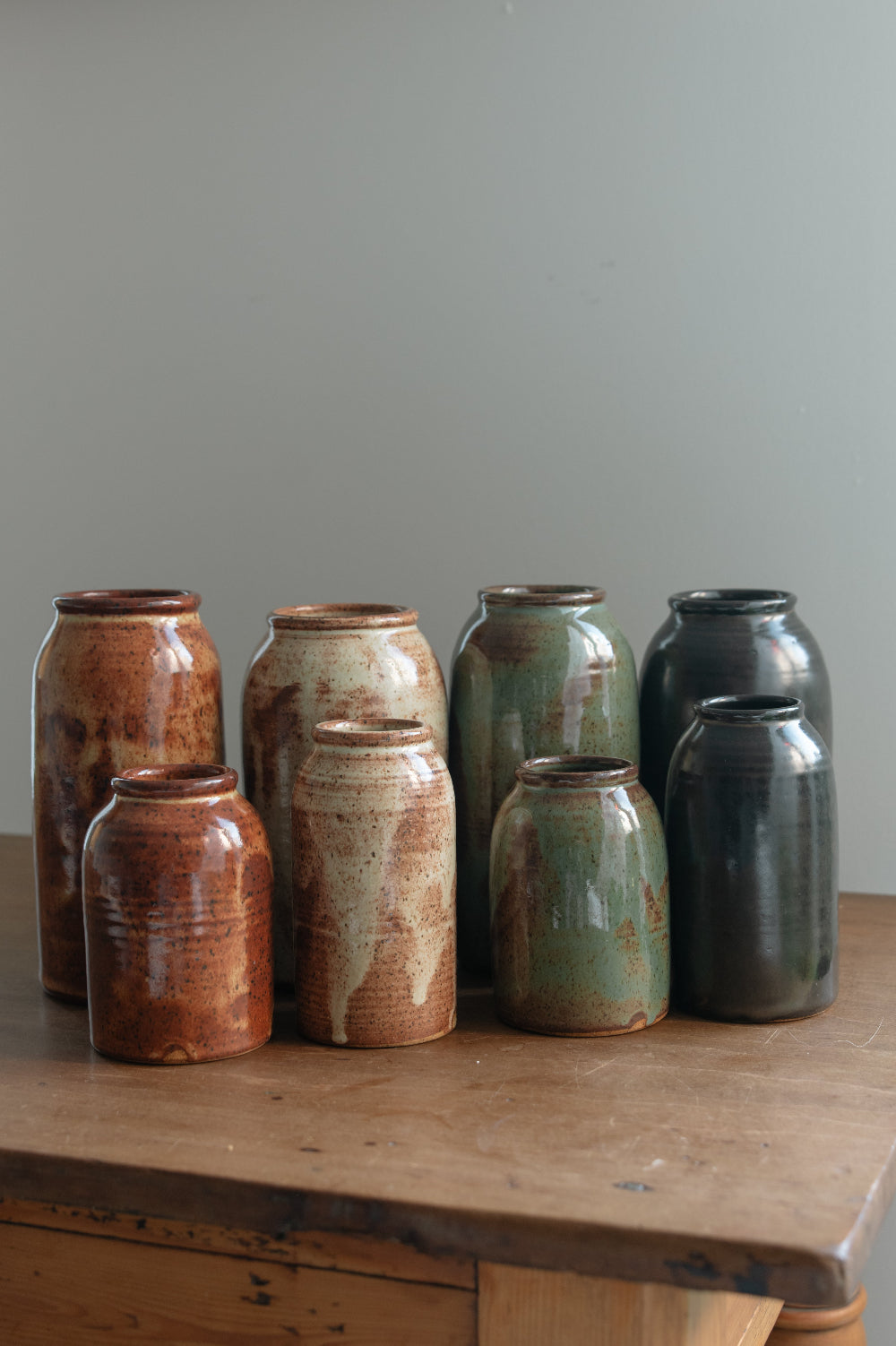 Size comparison between the small bottle vases (foreground) and large bottle vases (background)